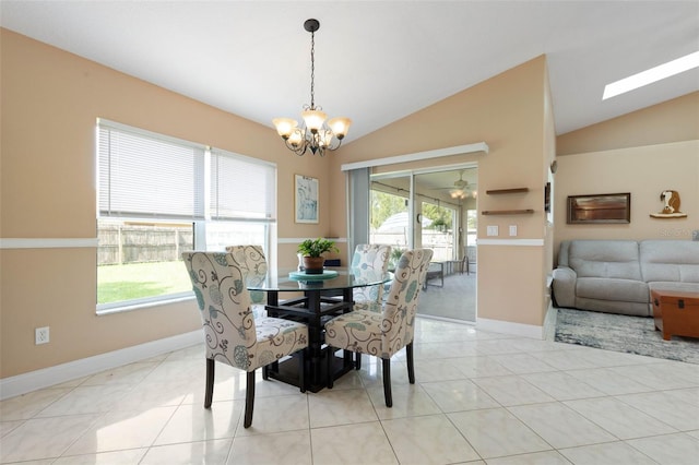 6 Prince Michael Ln, Palm Coast, FL 32164 - dining area with lofted ceiling, a chandelier, and light tile patterned floors