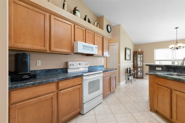 6 Prince Michael Ln, Palm Coast, FL 32164 - kitchen with white appliances, vaulted ceiling, a chandelier, pendant lighting, and brown cabinetry