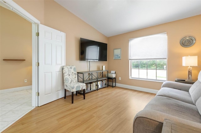 6 Prince Michael Ln, Palm Coast, FL 32164 - living area featuring lofted ceiling and light wood-type flooring