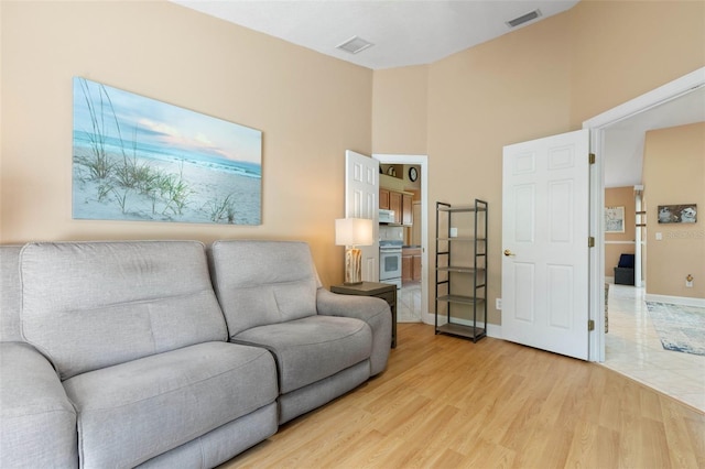6 Prince Michael Ln, Palm Coast, FL 32164 - living area featuring light wood-style floors and baseboards