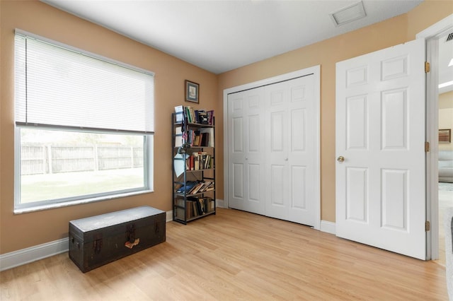 6 Prince Michael Ln, Palm Coast, FL 32164 - bedroom with light wood finished floors and a closet