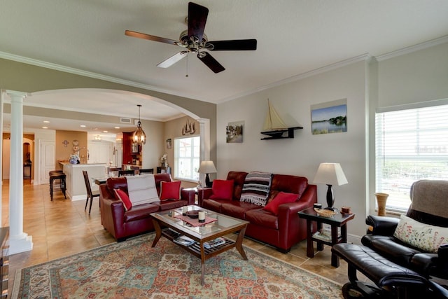 146 Palm Coast Resort Blvd Unit 501, Palm Coast, FL 32137 - living area featuring arched walkways, light tile patterned floors, decorative columns, ornamental molding, and a ceiling fan