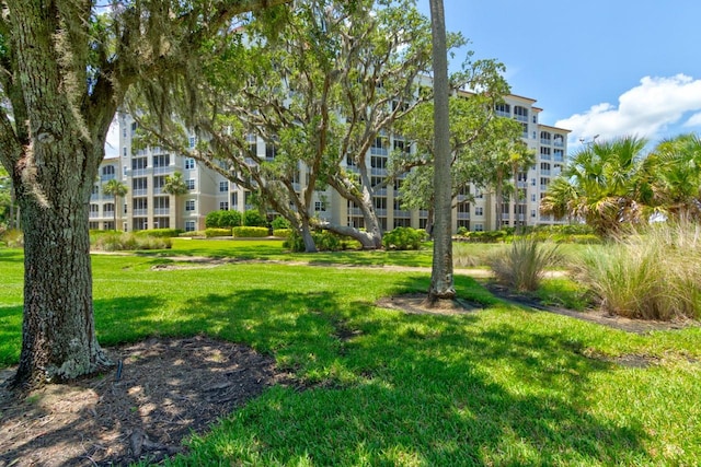 146 Palm Coast Resort Blvd Unit 501, Palm Coast, FL 32137 - view of home's community featuring a lawn