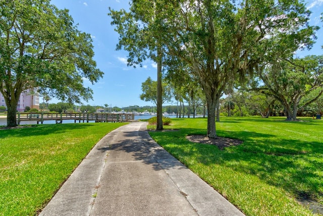 146 Palm Coast Resort Blvd Unit 501, Palm Coast, FL 32137 - view of community with a water view and a lawn
