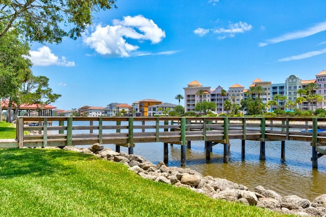 146 Palm Coast Resort Blvd Unit 501, Palm Coast, FL 32137 - dock area with a water view and a yard