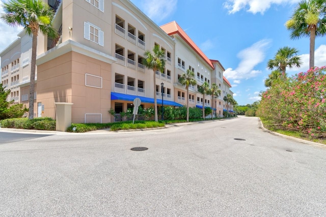 146 Palm Coast Resort Blvd Unit 501, Palm Coast, FL 32137 - view of apartment building / complex