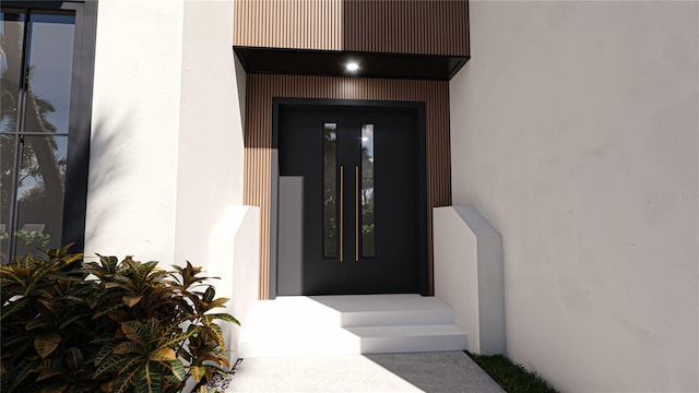 2360 Ocean Shore Blvd Unit 18, Ormond Beach, FL 32176 - doorway to property featuring stucco siding