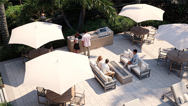 2360 Ocean Shore Blvd Unit 18, Ormond Beach, FL 32176 - view of patio with outdoor dining space, an outdoor living space with a fire pit, and area for grilling