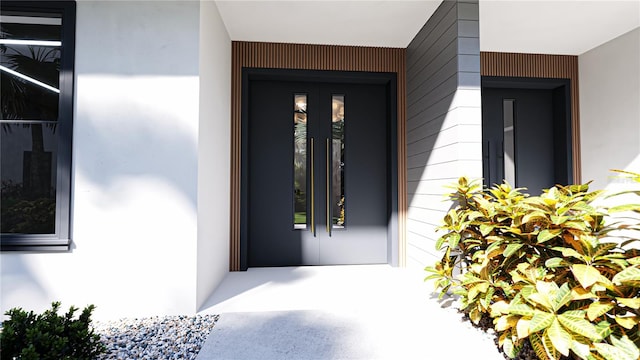2360 Ocean Shore Blvd Unit 24, Ormond Beach, FL 32176 - entrance to property with stucco siding and french doors