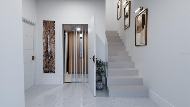 2360 Ocean Shore Blvd Unit 24, Ormond Beach, FL 32176 - stairs featuring marble finish floors and baseboards