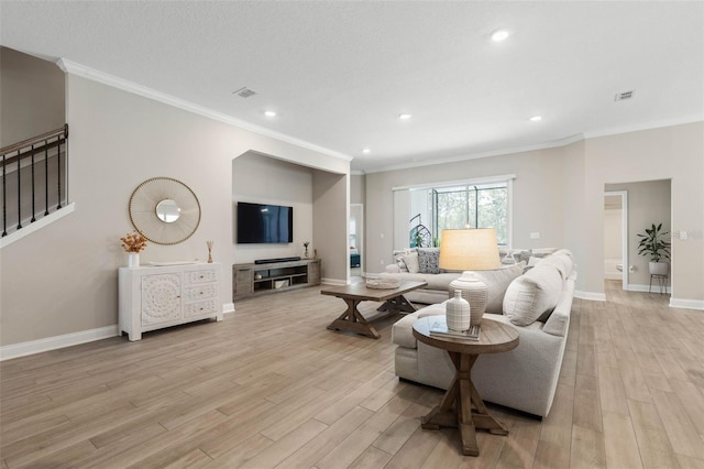 43 Lumber Jack Trl, Palm Coast, FL 32137 - living room with light wood-style floors, crown molding, recessed lighting, and stairway