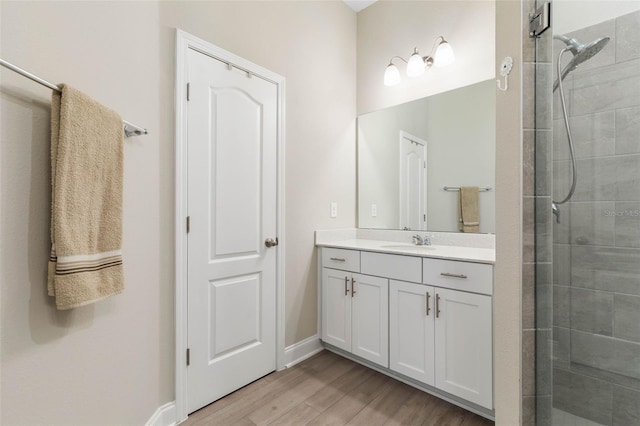 43 Lumber Jack Trl, Palm Coast, FL 32137 - full bath with a tile shower, vanity, and wood finished floors