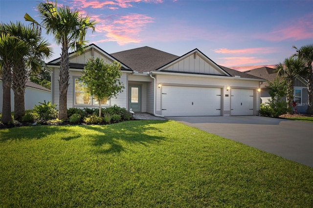 43 Lumber Jack Trl, Palm Coast, FL 32137 - view of front of property with a garage, driveway, a front yard, board and batten siding, and a shingled roof