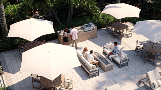 2360 Ocean Shore Blvd Unit 11, Ormond Beach, FL 32176 - view of patio with outdoor dining space, an outdoor living space with a fire pit, and area for grilling