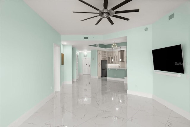 200 Ocean Crest Dr Unit 1111, Palm Coast, FL 32137 - unfurnished living room featuring a ceiling fan, light marble finish floors, and a chandelier