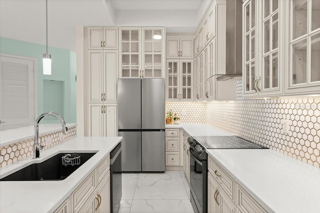 200 Ocean Crest Dr Unit 1111, Palm Coast, FL 32137 - kitchen with appliances with stainless steel finishes, wall chimney exhaust hood, light marble finish floors, decorative backsplash, and light countertops