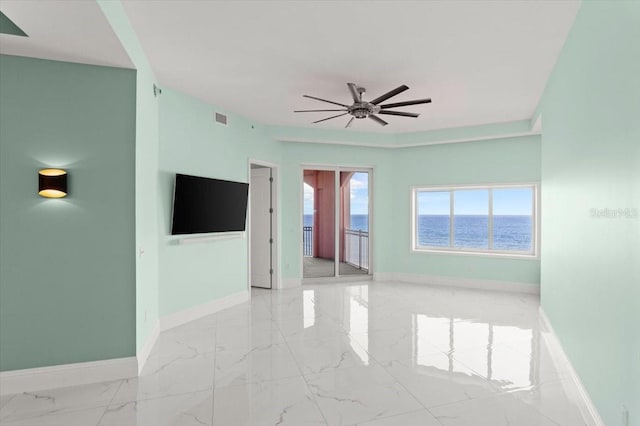 200 Ocean Crest Dr Unit 1111, Palm Coast, FL 32137 - unfurnished room with marble finish flooring and a ceiling fan