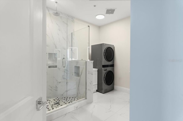 200 Ocean Crest Dr Unit 1111, Palm Coast, FL 32137 - full bath with stacked washer / drying machine, a marble finish shower, and marble finish floors