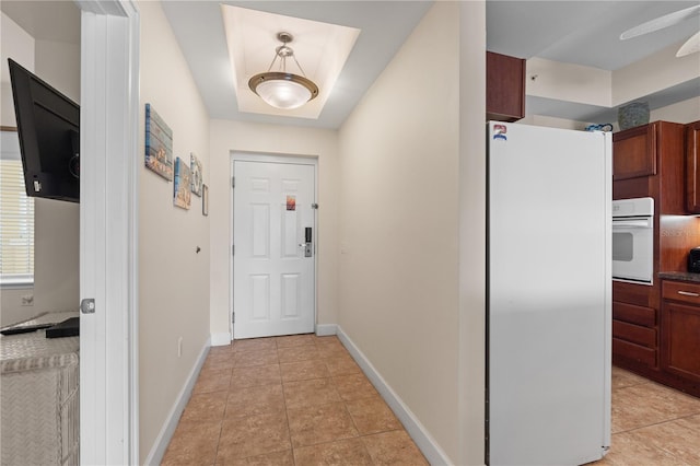 102 Yacht Harbor Dr Unit 475, Palm Coast, FL 32137 - doorway with light tile patterned floors and a ceiling fan