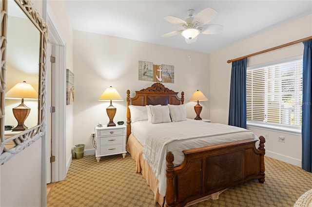 102 Yacht Harbor Dr Unit 475, Palm Coast, FL 32137 - bedroom with light colored carpet and ceiling fan