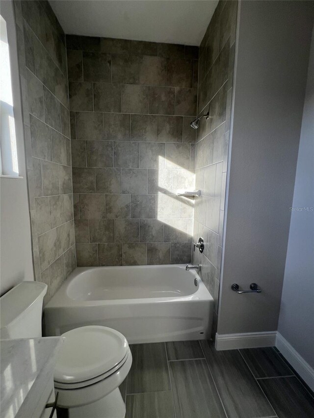 219 Hawthorn Ave, Palm Coast, FL 32164 - full bath featuring  shower combination and vanity