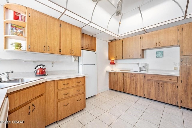 918 N Wild Olive Ave, Daytona Beach, FL 32118 - kitchen featuring white appliances, light countertops, open shelves, and light tile patterned floors