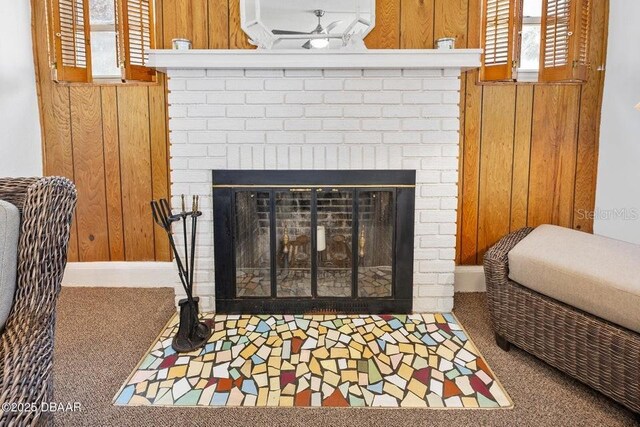 918 N Wild Olive Ave, Daytona Beach, FL 32118 - detailed view of wooden walls, a wall mounted AC, ceiling fan, and a brick fireplace