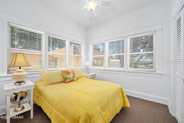 918 N Wild Olive Ave, Daytona Beach, FL 32118 - bedroom featuring carpet, multiple windows, and a ceiling fan