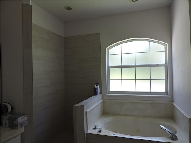 400 S County Road 115, Bunnell, FL 32110 - full bathroom featuring a tub with jets and a walk in shower