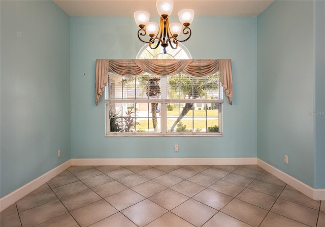 38 Mount Vernon Ln, Palm Coast, FL 32164 - tiled spare room with a chandelier and baseboards