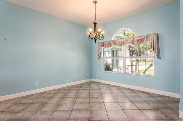 38 Mount Vernon Ln, Palm Coast, FL 32164 - spare room with a chandelier and tile patterned flooring