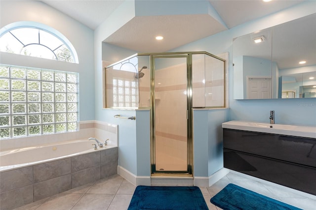 38 Mount Vernon Ln, Palm Coast, FL 32164 - full bathroom featuring healthy amount of natural light, tile patterned flooring, vanity, a stall shower, and recessed lighting