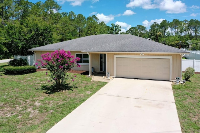 1 Wilson Pl, Palm Coast, FL 32164 - ranch-style house featuring a garage, driveway, and roof with shingles