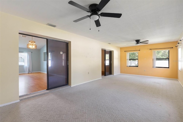 1 Wilson Pl, Palm Coast, FL 32164 - carpeted empty room with ceiling fan