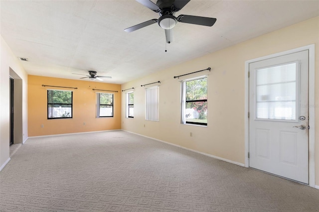 1 Wilson Pl, Palm Coast, FL 32164 - spare room with a ceiling fan, plenty of natural light, and carpet flooring