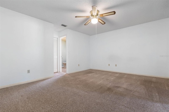 1 Wilson Pl, Palm Coast, FL 32164 - carpeted empty room featuring a ceiling fan and a textured ceiling