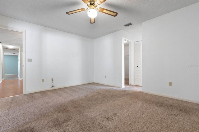 1 Wilson Pl, Palm Coast, FL 32164 - carpeted spare room featuring ceiling fan and baseboards