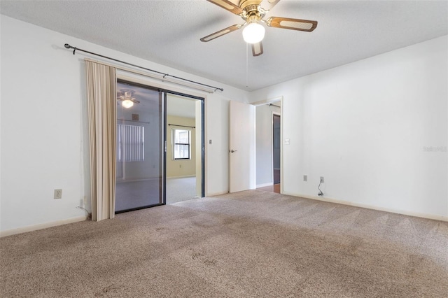 1 Wilson Pl, Palm Coast, FL 32164 - unfurnished bedroom with carpet floors and a ceiling fan
