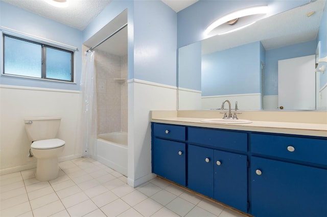 1 Wilson Pl, Palm Coast, FL 32164 - bathroom with vanity, shower / bathtub combination with curtain, tile patterned flooring, and a textured ceiling