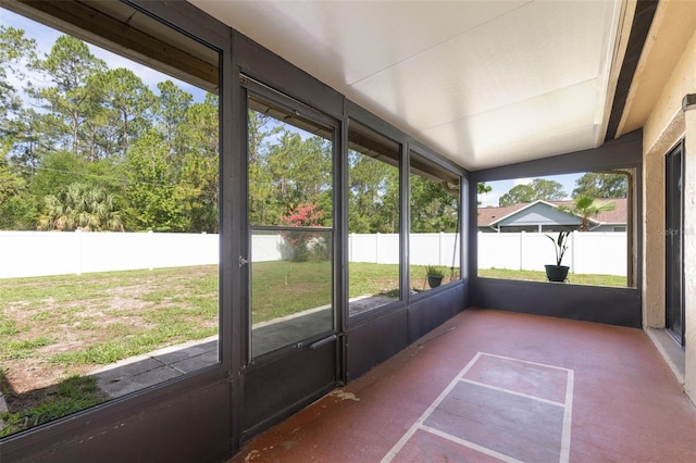 1 Wilson Pl, Palm Coast, FL 32164 - unfurnished sunroom with vaulted ceiling