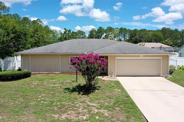 1 Wilson Pl, Palm Coast, FL 32164 - view of front of home with an attached garage and driveway