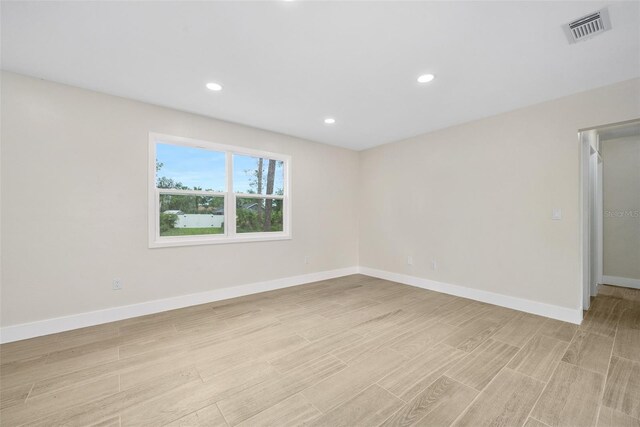 3 Fenwood Ln, Palm Coast, FL 32137 - unfurnished room featuring light wood-type flooring and recessed lighting