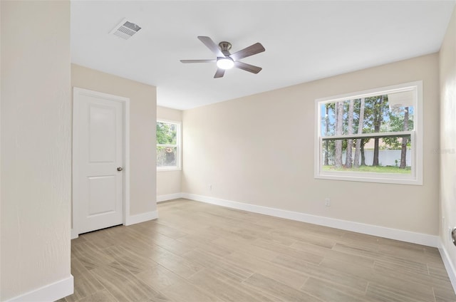 3 Fenwood Ln, Palm Coast, FL 32137 - spare room with a ceiling fan and light wood-style flooring