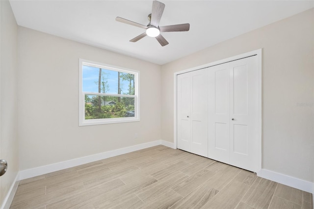 3 Fenwood Ln, Palm Coast, FL 32137 - unfurnished bedroom featuring light wood-style flooring, a closet, and a ceiling fan