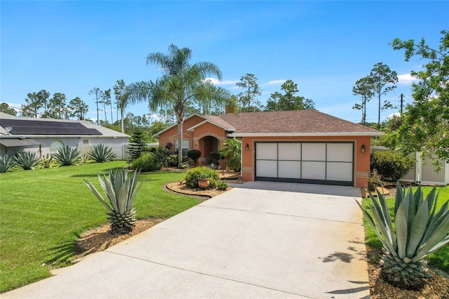 5 Zorlou Ct, Palm Coast, FL 32164 - view of front of house with driveway, an attached garage, a front yard, stucco siding, and roof with shingles