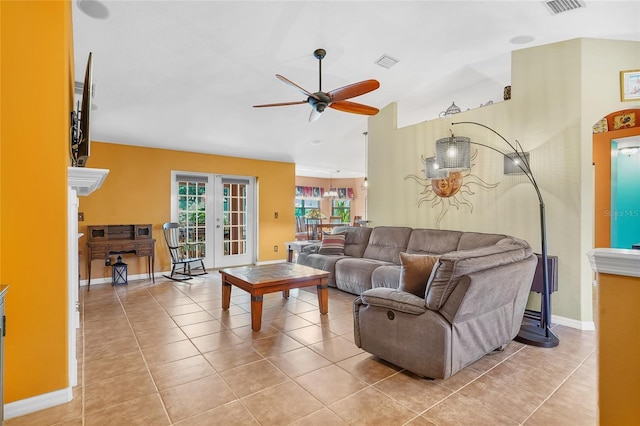 5 Zorlou Ct, Palm Coast, FL 32164 - living area with ceiling fan, vaulted ceiling, french doors, and light tile patterned floors