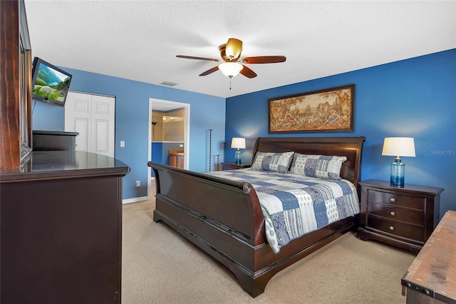 5 Zorlou Ct, Palm Coast, FL 32164 - bedroom featuring light carpet, connected bathroom, and a ceiling fan