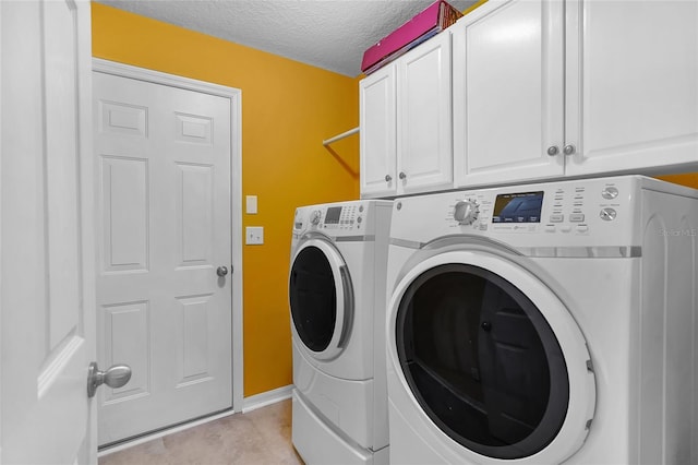 5 Zorlou Ct, Palm Coast, FL 32164 - laundry area with cabinet space, washing machine and dryer, and a textured ceiling