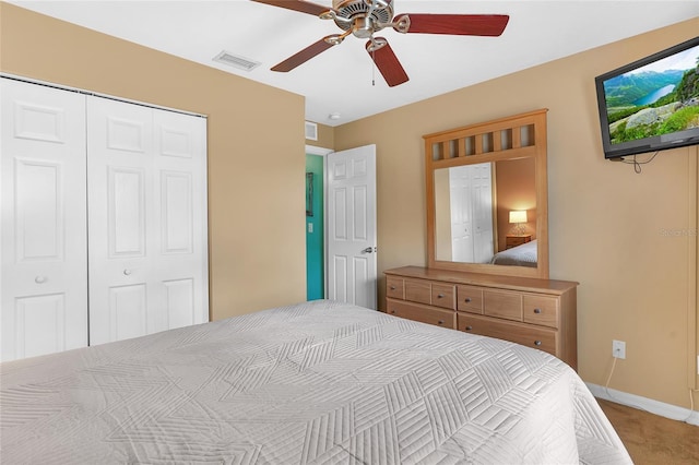 5 Zorlou Ct, Palm Coast, FL 32164 - bedroom with a closet, light carpet, and ceiling fan