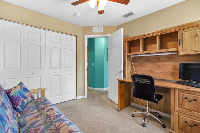 5 Zorlou Ct, Palm Coast, FL 32164 - home office featuring light carpet, ceiling fan, and built in desk